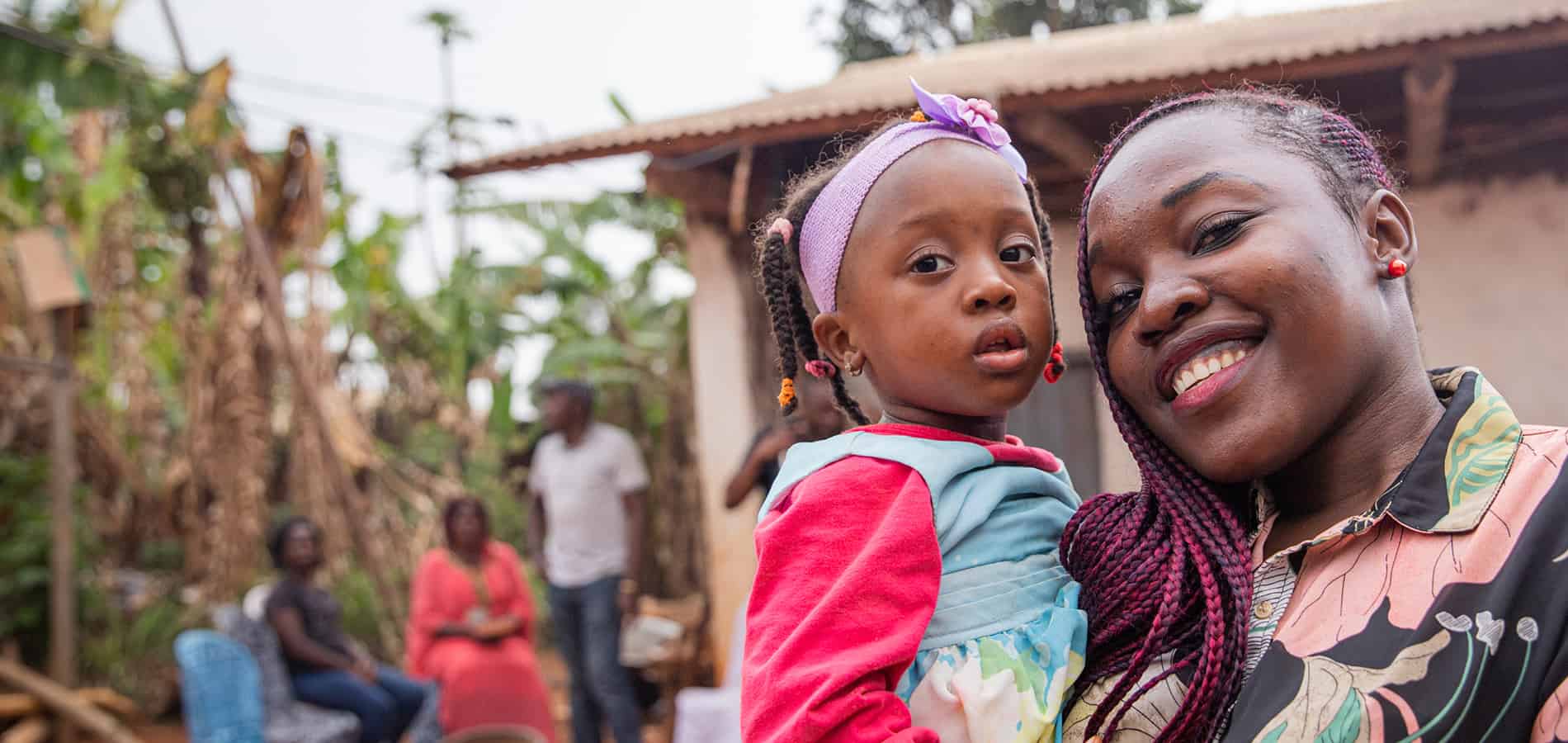 African Woman Holding Child