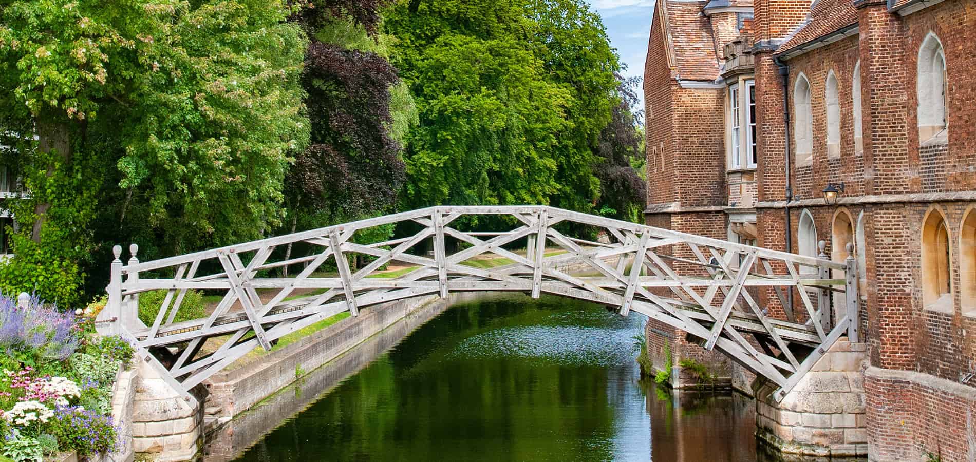 Photo of the Mathematical Bridge, Queens College, Cambridge. Courtesy Cajeo Zhang, Unsplash